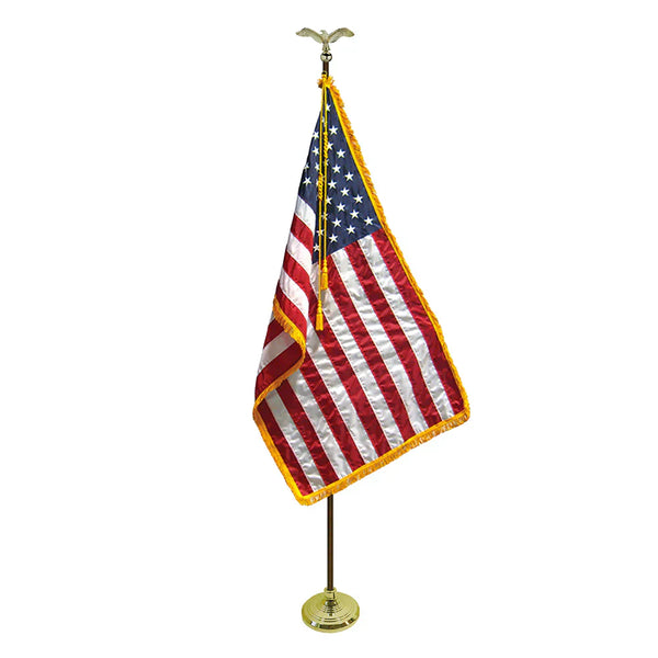 American indoor flag display set with oak pole and gold fringe in a formal ceremonial setup by Kengla Flag Co.