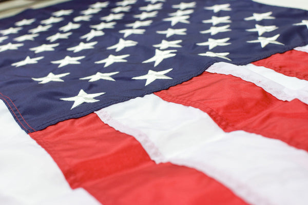 Close-up of an American flag’s stars and stripes displayed by Kengla Flag Co.